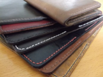 Stack of RO-ARK bifold card cases